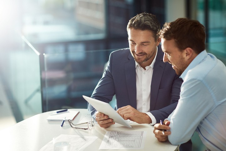 Cropped shot of two businessmen meeting in the office