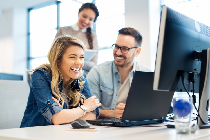 Group Of Business People And Software Developers Working As A Team In Office