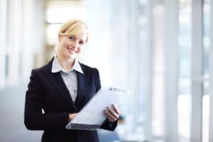 A gorgeous young businesswoman going over business itinerary alongside copyspace